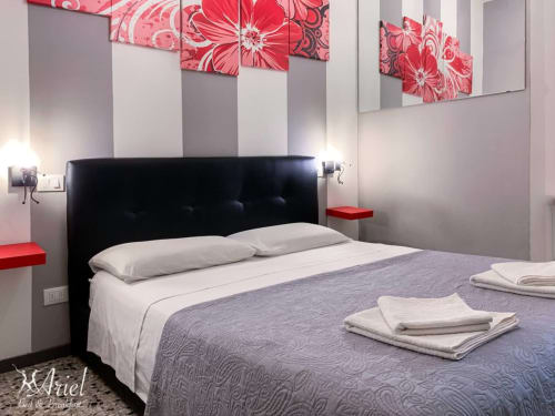 Un regard sur Chambre Fleur - Bed Breakfast Ariel B&B - Chambres dans le centre de Vérone