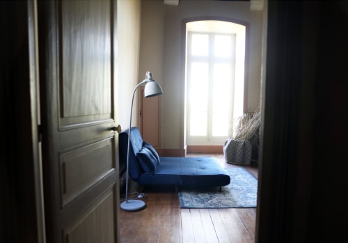sofa in the suite - stay at Chateau Le Breuil