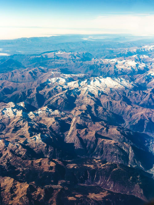 Aerial view of snow-capped Pyrenees mountains near Montaut, France vacation rental