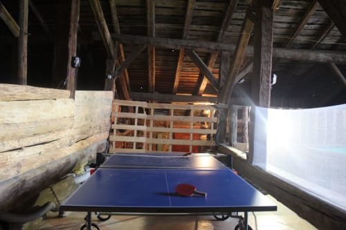 Ping pong table in rustic barn at La Maison De L'Épine, Aime la Plagne
