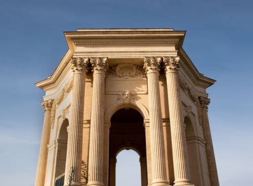 Classical columns and arches of historic Montpellier architecture near Mas De Lafeuillade boutique hotel