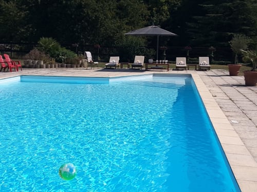 Château de Ré pool with loungers and umbrella, Le Petit Pressigny