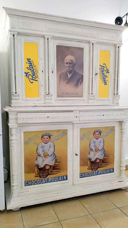 Vintage Chocolat Poulain display cabinet at Locacharme cottage La Chocolaterie in Blois, France