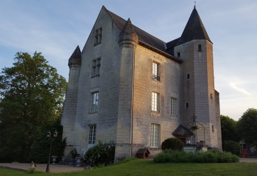 Château de Ré, a stone castle B&B in Le Petit Pressigny, France, with turrets and manicured grounds