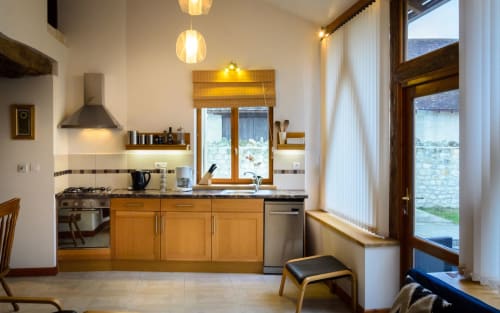 Fully equipped kitchen, living room in Cussay, Indre-et-Loire, Maison Arc en ciel, France. 