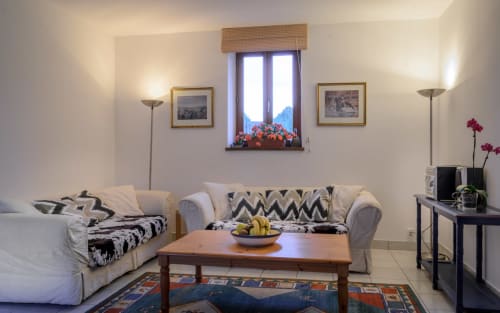 Large living room with fruit basket, Maison des arches de muschamp, Indre-et-Loire, France.