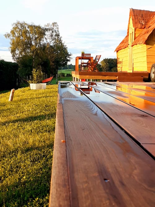 Terrace of the magic hut, unusual accommodation, Les refuges du chalet, Belgium. 