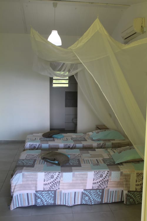 chambre enfant - Location de villas et bungalow - Oasis de Grande Anse à Deshaies en Guadeloupe