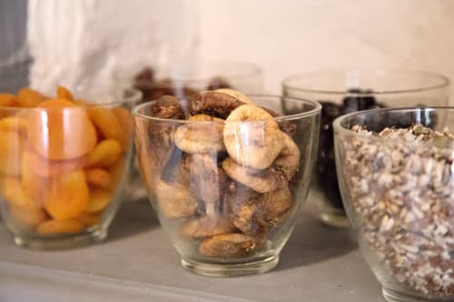 Full breakfast, dried apricots, dried figs, cereals. 