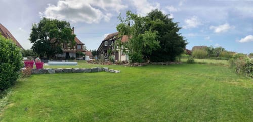 Le Clos d'Azel B&B in Alsace, France with spacious gardens, half-timbered houses, and lush green grounds