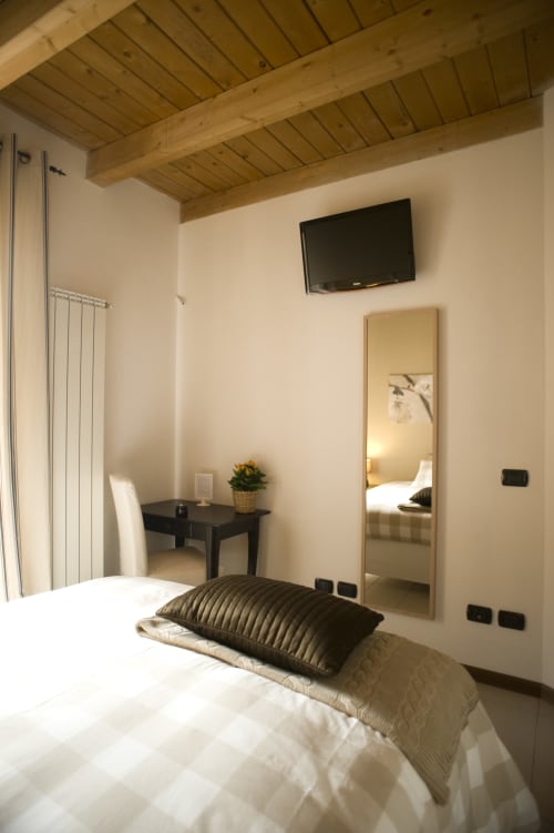 Camera 40 | camera singola con bagno privato a Gorgonzola (MI). Appartamento con cucina, tavolo da pranzo e ogni servizio per farti sentire a casa.