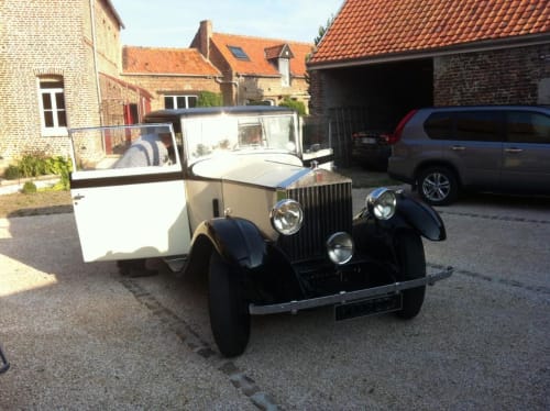 Vintage black car with white trailer at La ferme de l'Ostrevent B&B in Estrées, France