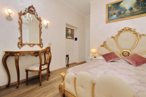 Camera matrimoniale superior di Just Chilling Suite, per soggiorni in coppia con bagno privato, in centro a Roma