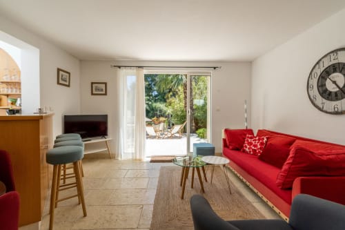 Séjour ouvrant sur la terrasse du rez-de-chaussée