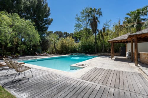 Piscine avec vue dégagée et jardin exotique