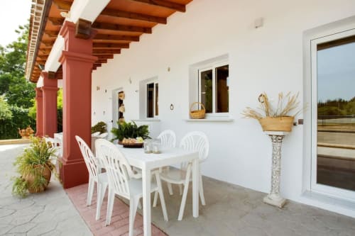 Porche exterior cubieto (Casas)