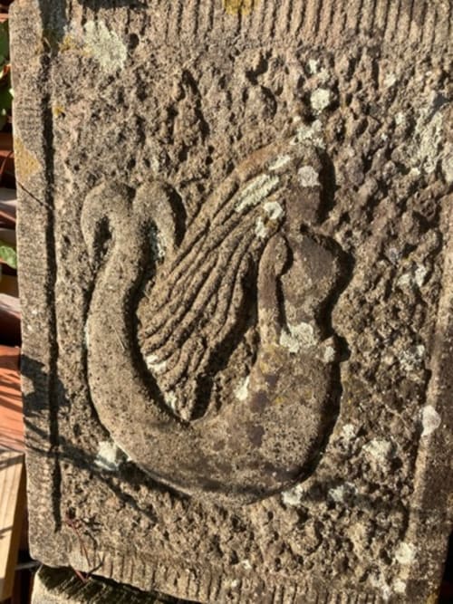 Stone relief carving at Le Clos d'Azel, French countryside B&B in Alsace region