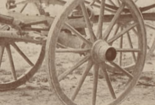 Rustic wooden wagon wheels at Le Clos d'Azel countryside B&B in Alsace, France