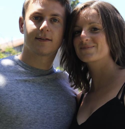Two staff members smiling at Manoir de la Nogrie hotel in Val d'Izé, France