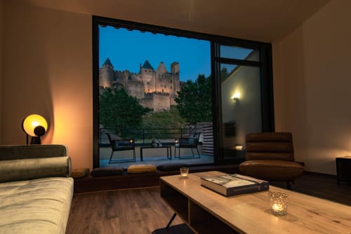Espace salon avec vue sur les remparts de Carcassonne - Le loft