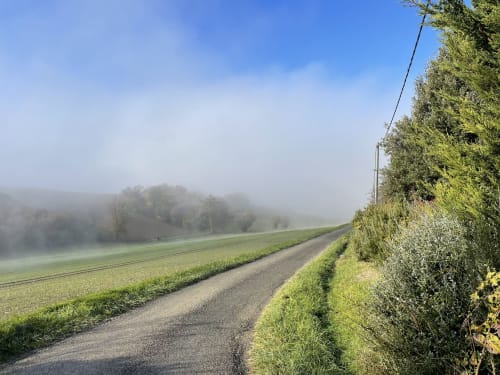 Rural countryside road with misty fields near Montaut, France - Maison Monsieur Léger vacation property