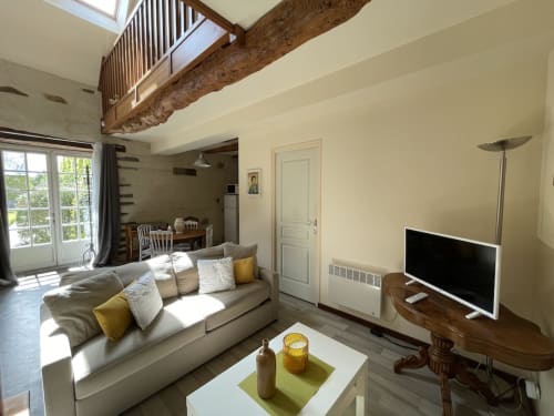 Espace salon, grand espace de vie, gîte Le chateaubriand, Manoir de la Bégaudière, logement équipé, Mont-Dol.