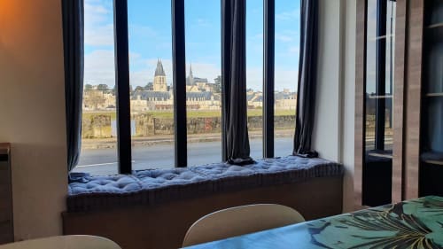 Blois riverside cottage view with elegant window seat overlooking Loire Valley churches and water