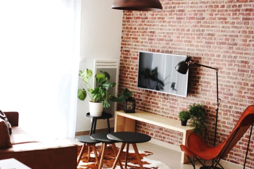 Salon lumineux - Mur en brique - Appartement loft - Appart'hôtel Le Clos de la couturelle