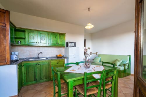 Appartamento 1A | Casa Anna, Santa Maria Navarrese, Appartamenti, Sardegna, Ogliastra, Letto matrimoniale, Letto a castello, Cucina attrezzata, Divano letto, Bagno privato, TV, Gazebo