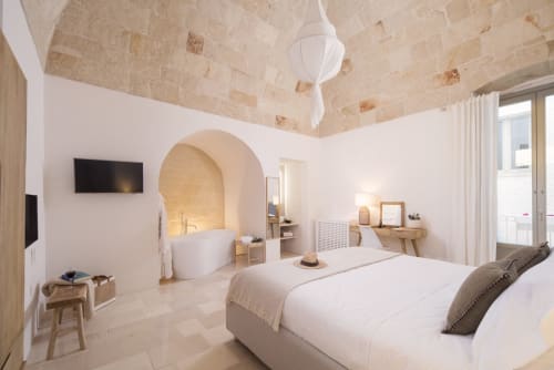 Welcome to Palazzo Manzoni, where luxury meets authenticity in the heart of Monopoli. Immerse yourself in the timeless elegance of our meticulously restored palazzo, offering a refined retreat for discerning travelers.

Located just steps from Monopoli's historic center, Palazzo Manzoni boasts a prime position near shops, restaurants, and cultural attractions. Yet despite its central location, our palazzo provides a peaceful oasis where you can unwind after a day of exploration.

Step inside and discover interiors adorned with exquisite details, blending traditional Puglian style with modern sophistication. Each corner of our palazzo is designed to provide comfort and refinement, creating a welcoming and relaxing atmosphere for our guests.

Indulge in moments of tranquility in our private courtyard, where you can sip local wine amidst lush greenery and elegant architecture. Our central location allows us to offer personalized service tailored to your needs, ensuring a seamless and memorable stay in Monopoli.

Experience the charm and beauty of Monopoli with Palazzo Manzoni as your elegant home base. Whether you're exploring the historic center or relaxing in our serene courtyard, our palazzo offers the perfect blend of luxury and authenticity for your Apulian getaway.

@PalazzoManzoni #Monopoli #Puglia #LuxuryTravel #AuthenticExperience #ItalianHospitality #HistoricPalazzo #apulia #luxuryguesthouse 
