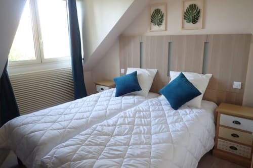 Suite familiale de 2 Chambres dont une de 3 personnes et une de 2 personnes avec vue sur jardin et lac