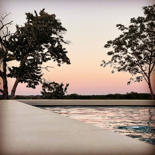Serene pool at sunrise at Domaine De Cazal, Saint-Cyprien