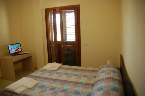 Suite Apartment | B&B 2000 Sassari, Sardegna, camere, matrimoniale, doppia, singola, alloggi, appartamenti, suite, bagno privato, doccia, TV, wifi, terminal autobus, università, ospedale, spiaggia, mare, isola