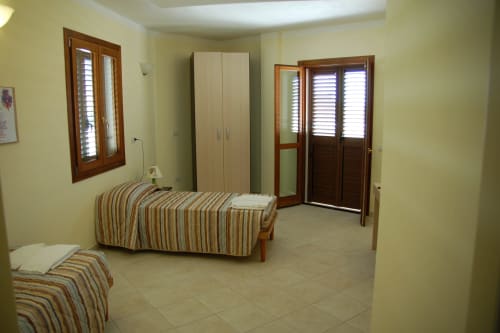 Suite Apartment | B&B 2000 Sassari, Sardegna, camere, matrimoniale, doppia, singola, alloggi, appartamenti, suite, bagno privato, doccia, TV, wifi, terminal autobus, università, ospedale, spiaggia, mare, isola