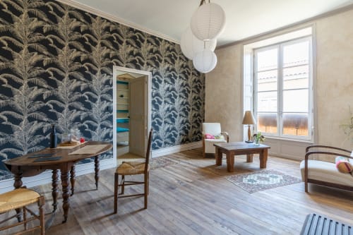 EcoLogis de Chantegrolle : Espace Jeanne Fradin de Bellabre, le salon, enduits chaux/chanvre sur murs périphériques, double vitrage, acoustique pour la chambre, accès de plain-pied, sur rue