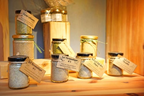 Artisanal aromatic salts and spice jars displayed at L'étape Du Fanfoué BnB in Chamrousse