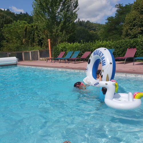 Children playing in the pool at Domaine du Cardou