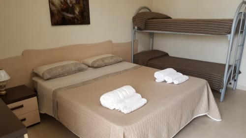 Emblema Appartamento 02 | Emblema Apartments Case Vacanza Torre Suda, Puglia, Gallipoli, Salento, mare, Maldive del Salento, letto matrimoniale, letto a castello, cucina, bagno privato