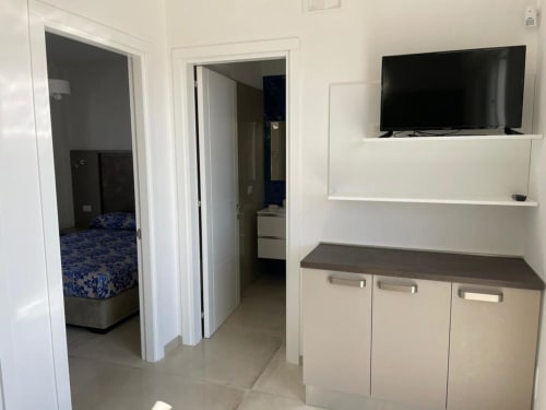 Elite Apartment Pool 03 Primo Piano | Elite Luxury Residence Case Vacanza Torre Suda, Puglia, Gallipoli, Salento, piscina, vacanze, mare, Maldive del Salento, letto matrimoniale, letti singoli, cucina, bagno privato