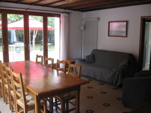 Séjour salon table 10 personnes  vue terrasse gîte les Dunes Saint-Jean-de-Monts