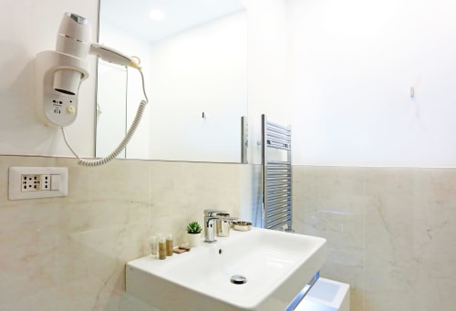 Triple room | HeMi Suites - Milano center