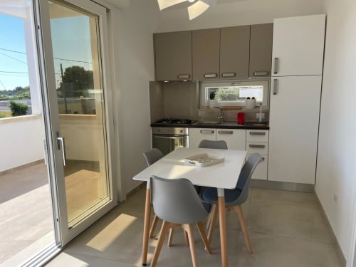 Elite Apartment Garden 03 Primo Piano | Elite Luxury Residence Case Vacanza Torre Suda, Puglia, Gallipoli, Salento, piscina, vacanze, mare, Maldive del Salento, letto matrimoniale, letti singoli, cucina, bagno privato