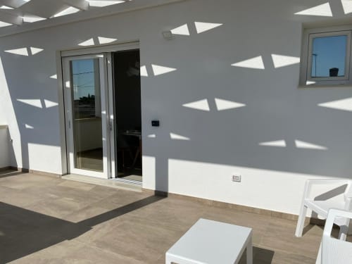 Elite Apartment Garden 03 Primo Piano | Elite Luxury Residence Case Vacanza Torre Suda, Puglia, Gallipoli, Salento, piscina, vacanze, mare, Maldive del Salento, letto matrimoniale, letti singoli, cucina, bagno privato