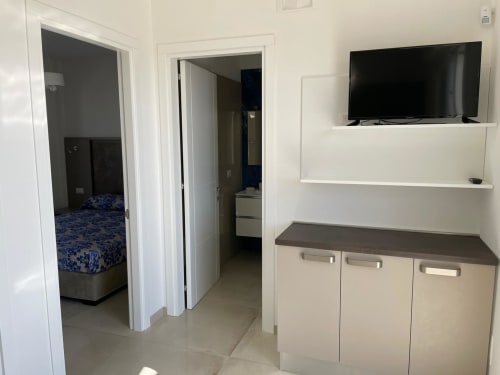 Elite Apartment Garden 03 Primo Piano | Elite Luxury Residence Case Vacanza Torre Suda, Puglia, Gallipoli, Salento, piscina, vacanze, mare, Maldive del Salento, letto matrimoniale, letti singoli, cucina, bagno privato