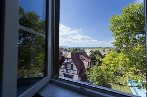 Clear and bright view from the window of the charming studio Les Rêveurs, a guest room allowing independence at Clos d'Azel.