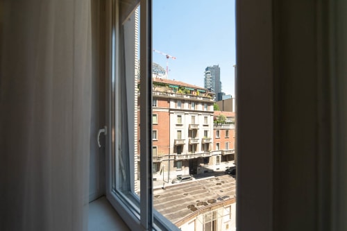 Corso Como A12| Apartment for 4 with one bedroom, living room with sofa bed, kitchen, balcony and bathroom with shower. With Wi-Fi, TV and air conditioning - HB Hall, flats in the centre of Milan.