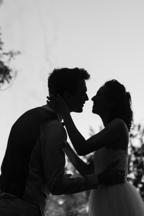 Romantic couple silhouette at Le Pavillon M, intimate moment in Grignan