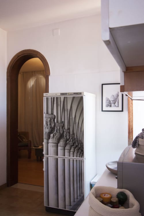 Regina d'Oriente apartment at Ca Cortigiane, Venice - modern interior with arched wooden doorway and display cabinet
