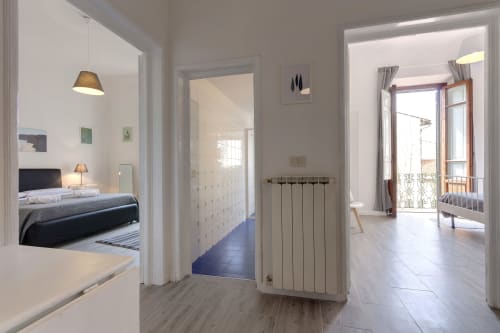 Sleep tight Florence garden view apartment hallway with bedroom, bathroom, and balcony access in Firenze