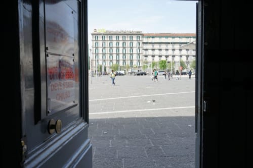 View from Royal Rooms Station Napoli overlooking Piazza Garibaldi in Naples, Italy with historic buildings and city square